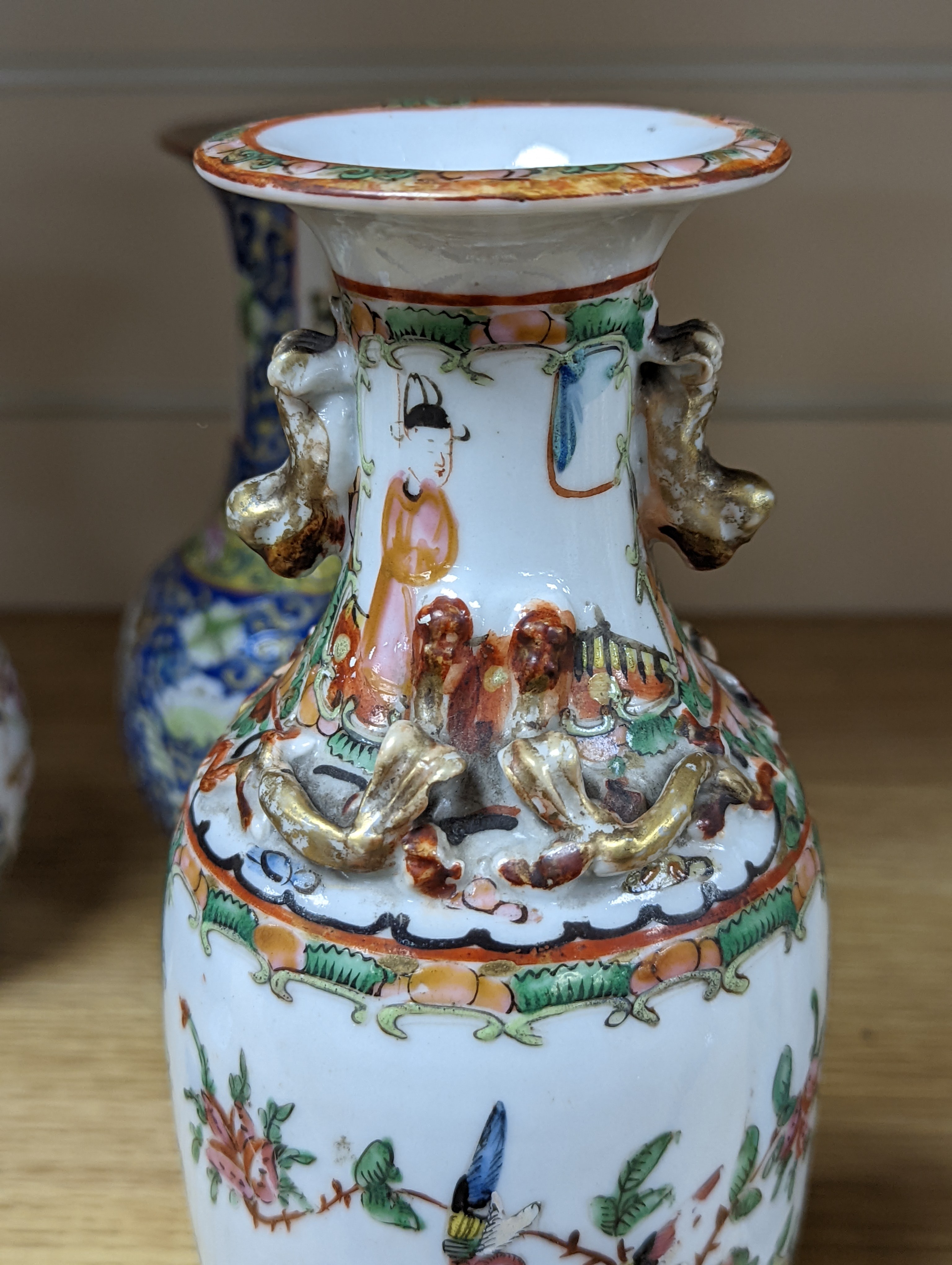 Four 19th century Chinese famille rose vases, 21cm